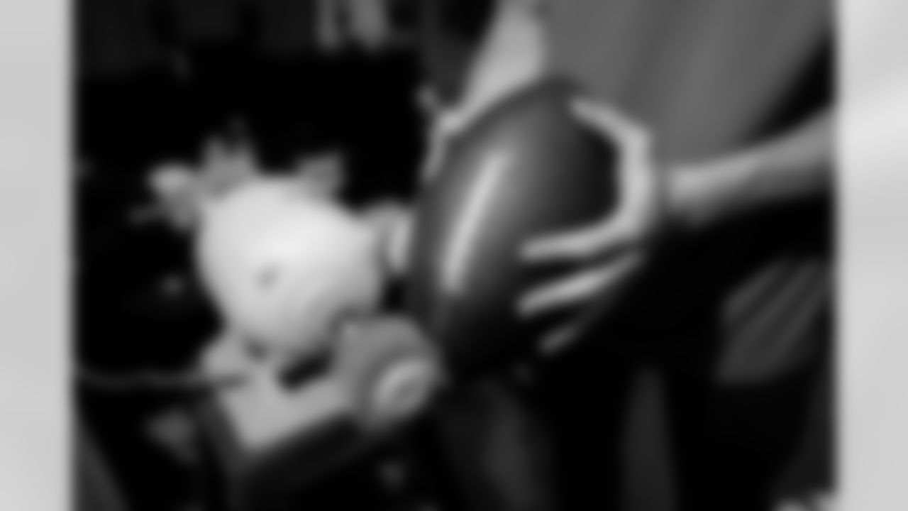 Jacksonville, Fla. — Jaguars football equipment staff prepare America 250 commemorative footballs at the Miller Electric Center on December 29, 2025.