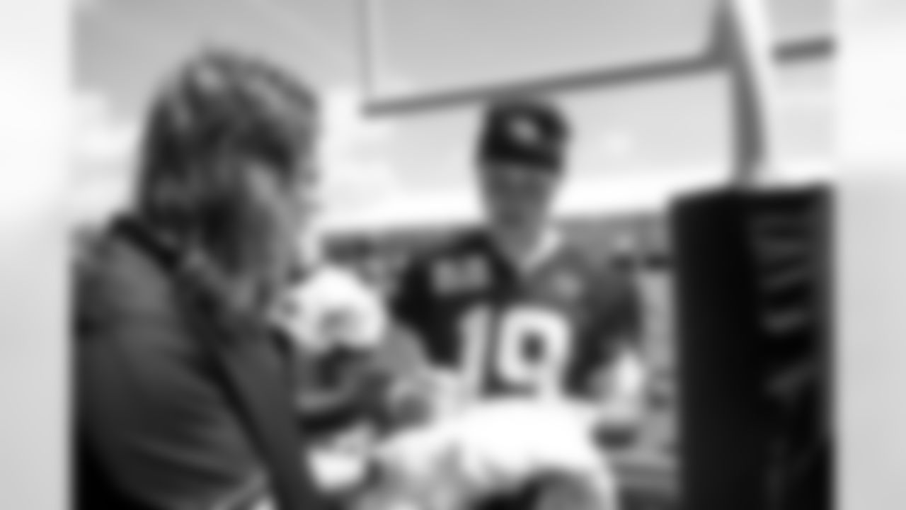 Jacksonville, Fla. — Jaguars quarterback Seth Henigan (19) sign autographs for fans during mandatory minicamp at the Miller Electric Center on June 11, 2025.