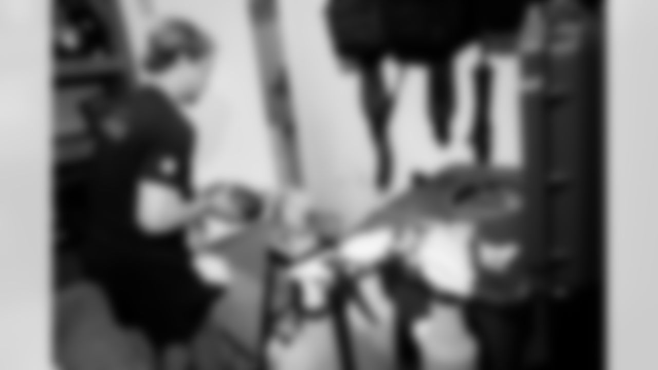 Jacksonville, Fla. — Jaguars football equipment staff prepare America 250 commemorative footballs at the Miller Electric Center on December 29, 2025.