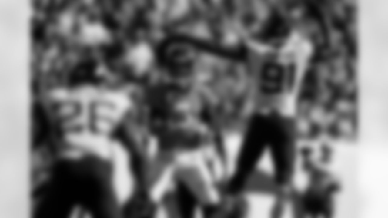 Denver Broncos quarterback Joe Flacco throws a pass as Jacksonville Jaguars defensive end Yannick Ngakoue (91) defends during the first half of an NFL football game Sunday, Sept. 29, 2019, in Denver. (AP Photo/Jack Dempsey)