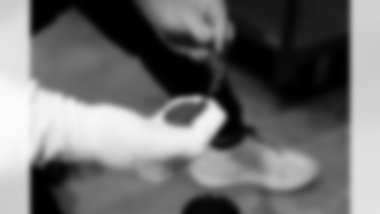 Jacksonville, Fla. — Jaguars football equipment staff prepare America 250 commemorative footballs at the Miller Electric Center on December 29, 2025.