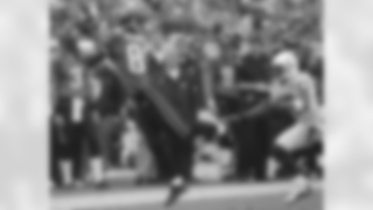 Jacksonville Jaguars receiver Cortez Hankton, left, makes a catch in front of Indianapolis Colts defender David Macklin, in the third quarter Sunday, Nov. 9, 2003, in Jacksonville, Fla. Jacksonville won, 28-23. (AP Photo/Phil Coale)