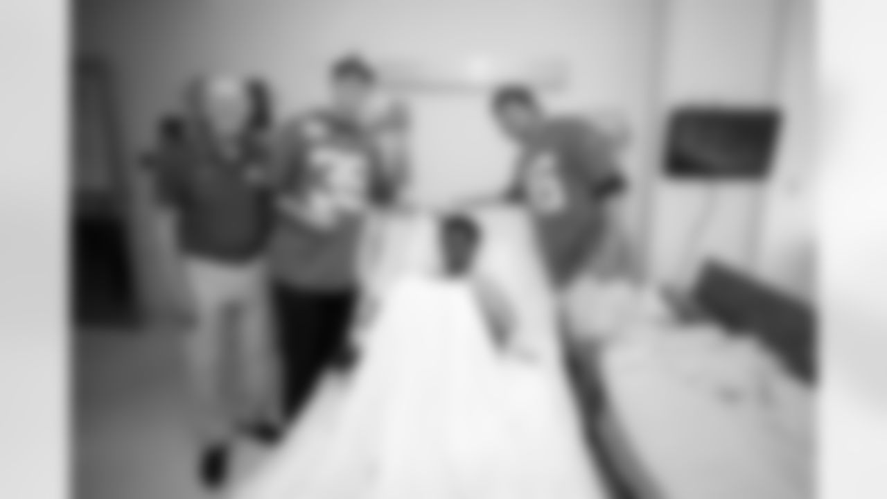 Jacksonville, Fla. – An image from a Wolfson Children's Hospital visit with Jaguars Legend Tom Coughlin, Jaguars kicker Cam Little and Jaguars long snapper Ross Matiscik on October 1, 2024.