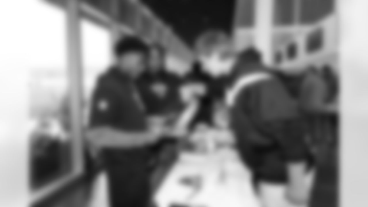 Jacksonville, Fla. — Jaguars defensive back Caleb Ransaw, running back Ja'Quinden Jackson and defensive lineman Ethan Downs (left to right) during the rookie cooking competition at the Miller Electric Center on June 3, 2025.