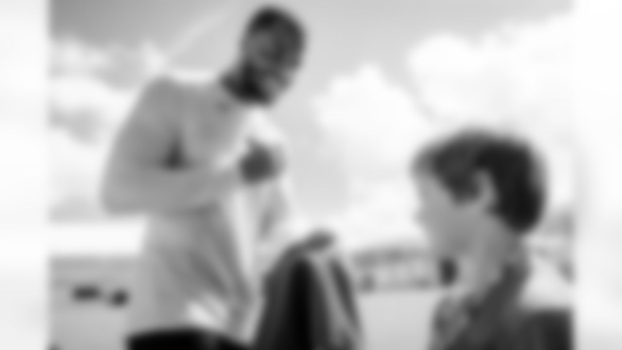 Jacksonville, Fla. — Jaguars cornerback Jourdan Lewis signs autographs after training camp at the Miller Electric Center on July 25, 2025.
