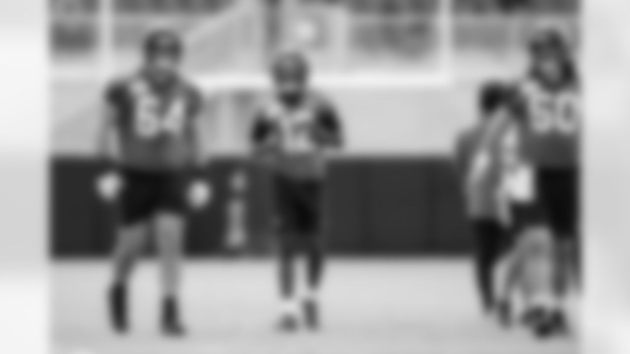 Jacksonville, Fla. — Jaguars offensive lineman Wyatt Milum (64) and wide receiver/defensive back Travis Hunter (12) during rookie minicamp at the Miller Electric Center on May 9, 2025.