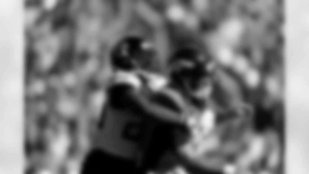 Denver Broncos quarterback Joe Flacco is hit by Jacksonville Jaguars defensive back D.J. Hayden as he throws a pass during the first half of an NFL football game Sunday, Sept. 29, 2019, in Denver. (AP Photo/Jack Dempsey)