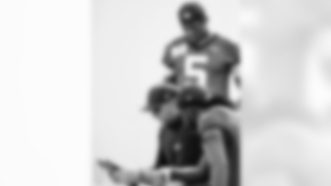 Jacksonville, Fla. — Jaguars head coach Liam Coen and wide receiver Brian Thomas Jr. (7) during training camp at the Miller Electric Center on July 23, 2025.