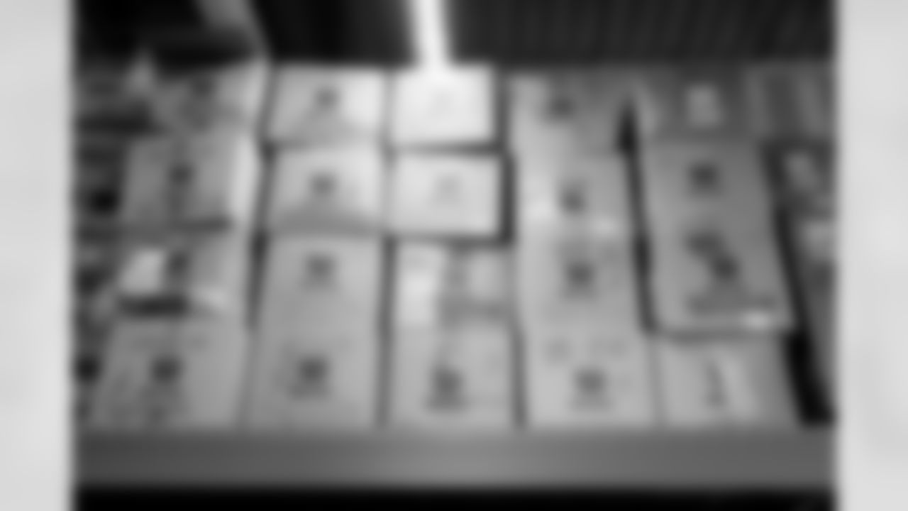 Jacksonville, Fla. — Jaguars football equipment staff prepare America 250 commemorative footballs at the Miller Electric Center on December 29, 2025.