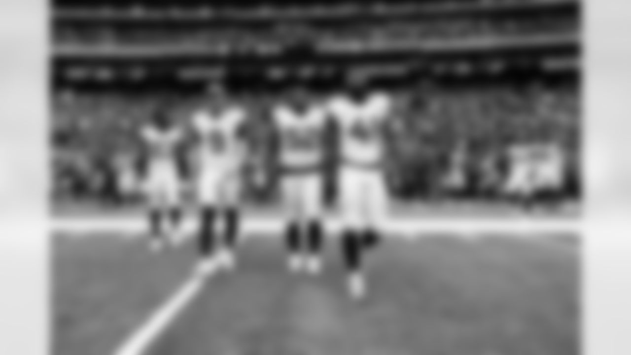 Jacksonville Jaguars vs Houston Texans

P Logan Cooke (9), DT DaVon Hamilton (52), and DE Josh Hines-Allen (41)