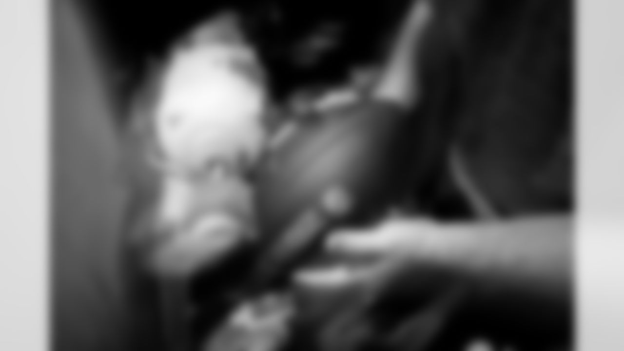 Jacksonville, Fla. — Jaguars football equipment staff prepare America 250 commemorative footballs at the Miller Electric Center on December 29, 2025.