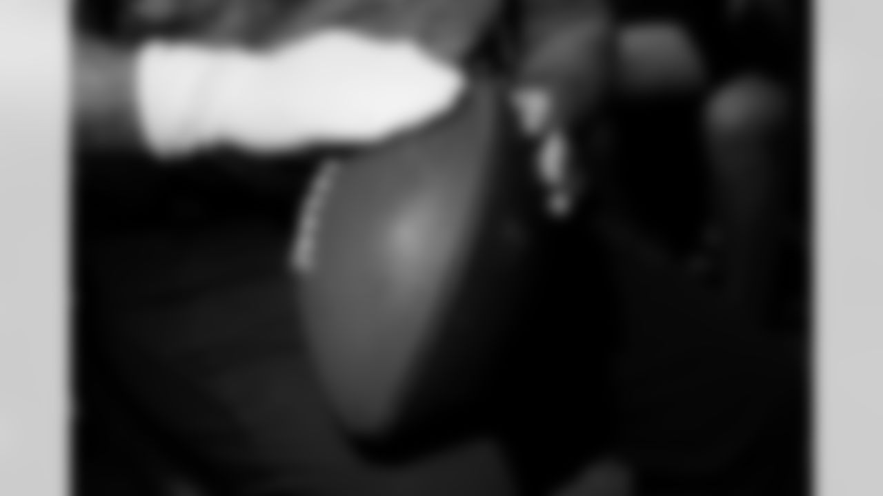 Jacksonville, Fla. — Jaguars football equipment staff prepare America 250 commemorative footballs at the Miller Electric Center on December 29, 2025.