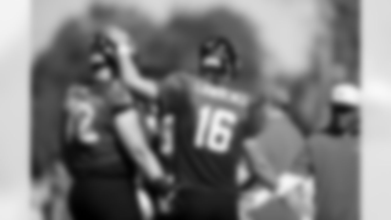 Jacksonville, Fla. — Jaguars offensive lineman Walker Little (72) and quarterback Trevor Lawrence (16) during training camp at the Miller Electric Center on July 28, 2025.