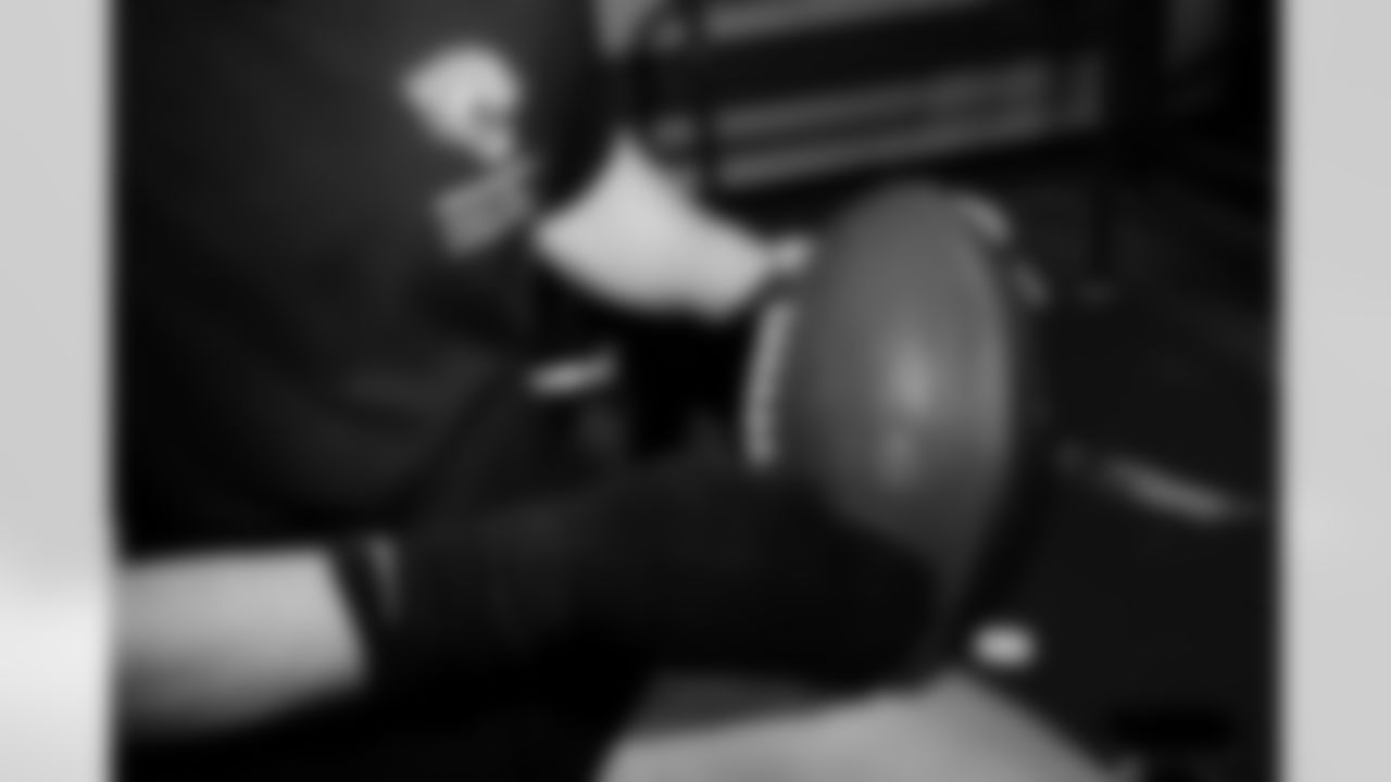 Jacksonville, Fla. — Jaguars football equipment staff prepare America 250 commemorative footballs at the Miller Electric Center on December 29, 2025.