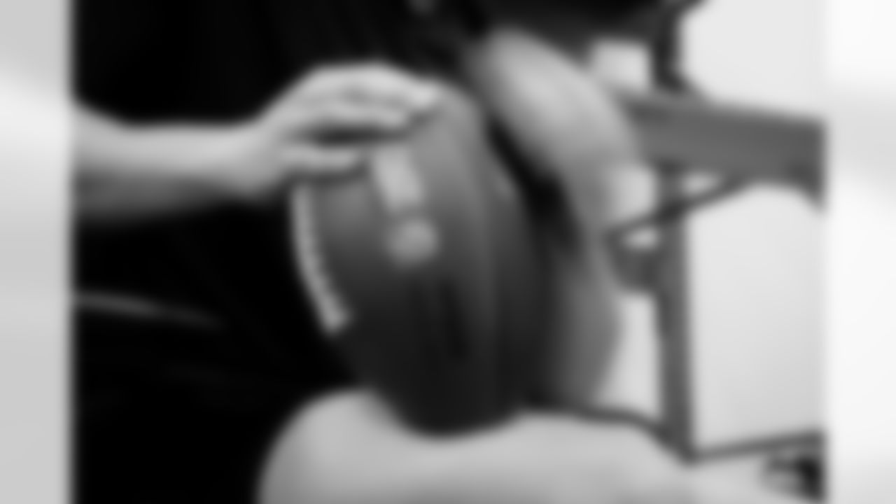 Jacksonville, Fla. — Jaguars football equipment staff prepare America 250 commemorative footballs at the Miller Electric Center on December 29, 2025.