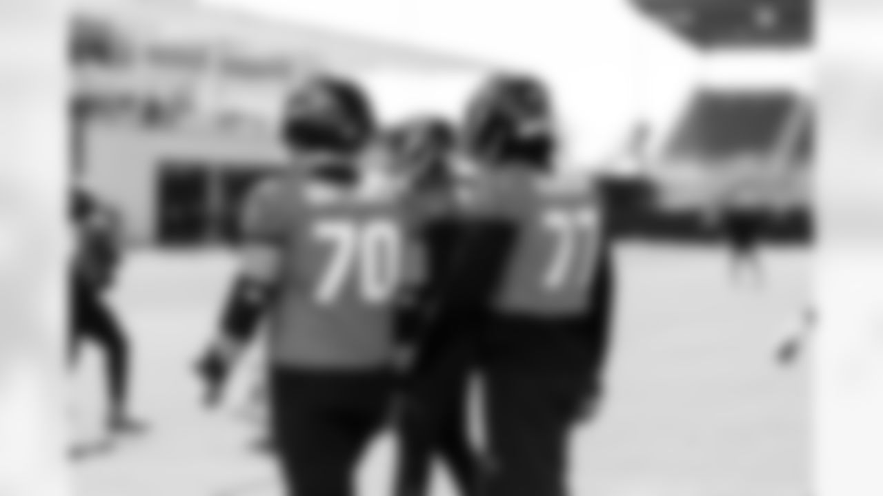 Jacksonville, Fla. — Jaguars offensive lineman Cole Van Lanen (70) and offensive lineman Anton Harrison (77) during practice at the Miller Electric Center on December 11, 2025.