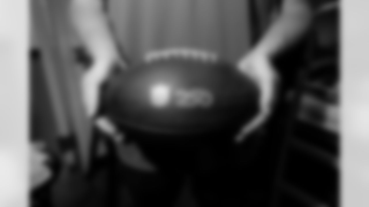 Jacksonville, Fla. — Jaguars football equipment staff prepare America 250 commemorative footballs at the Miller Electric Center on December 29, 2025.