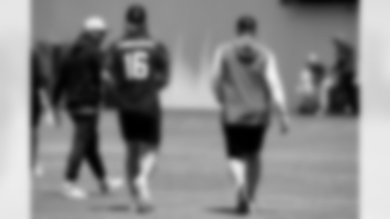 Jacksonville, Fla. — Jaguars quarterback Trevor Lawrence (16) and head coach Liam Coen during phase two of the voluntary offseason program at the Miller Electric Center on May 13, 2025.
