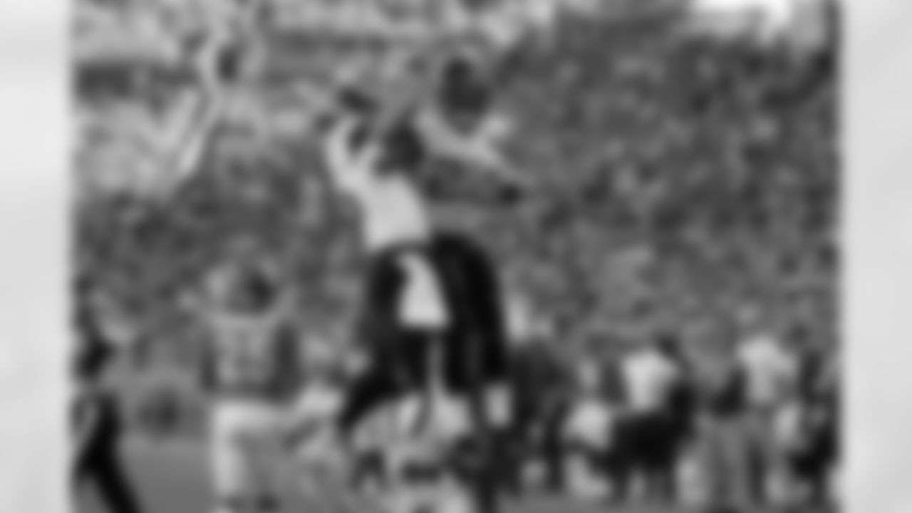 Jacksonville Jaguars running back Ryquell Armstead, right, celebrates with quarterback Gardner Minshew after scoring a touchdown during the second half of an NFL football game against the Denver Broncos, Sunday, Sept. 29, 2019, in Denver. (AP Photo/Jack Dempsey)