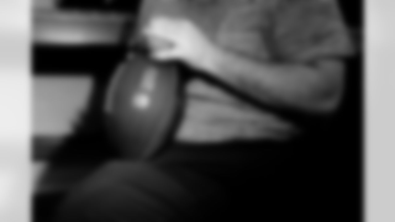 Jacksonville, Fla. — Jaguars football equipment staff prepare America 250 commemorative footballs at the Miller Electric Center on December 29, 2025.