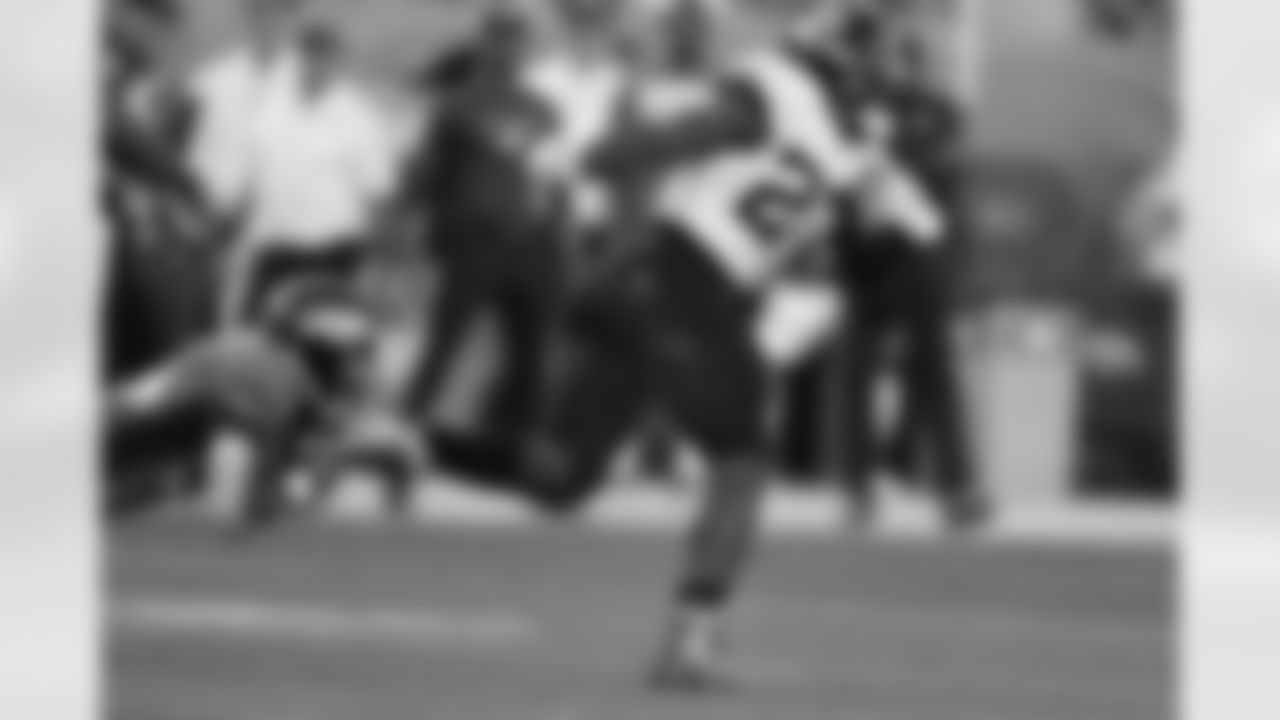 Jacksonville Jaguars running back Leonard Fournette, right, runs with the ball during the second half of an NFL football game against the Denver Broncos, Sunday, Sept. 29, 2019, in Denver. (AP Photo/David Zalubowski)