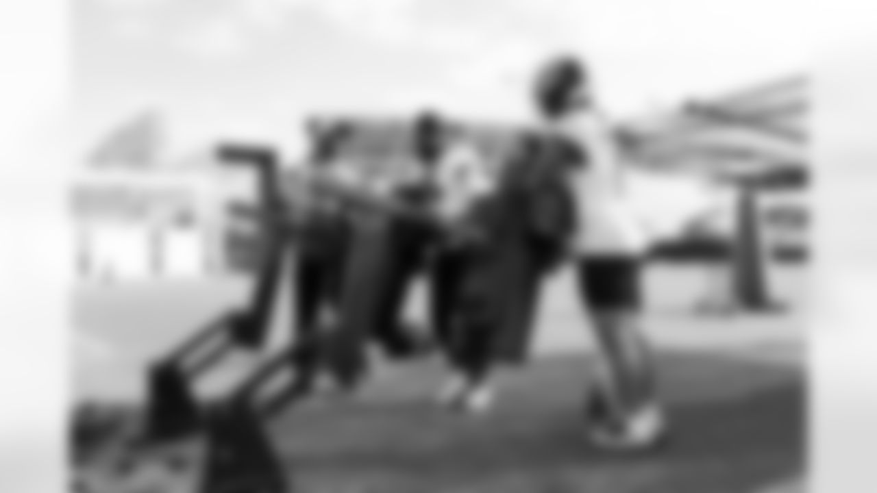 Jacksonville, Fla. — Jaguars wide receivers coach Edgar Bennett, wide receiver Dyami Brown (5), and wide receiver Parker Washington (11) during practice at the Miller Electric Center on December 25, 2025.