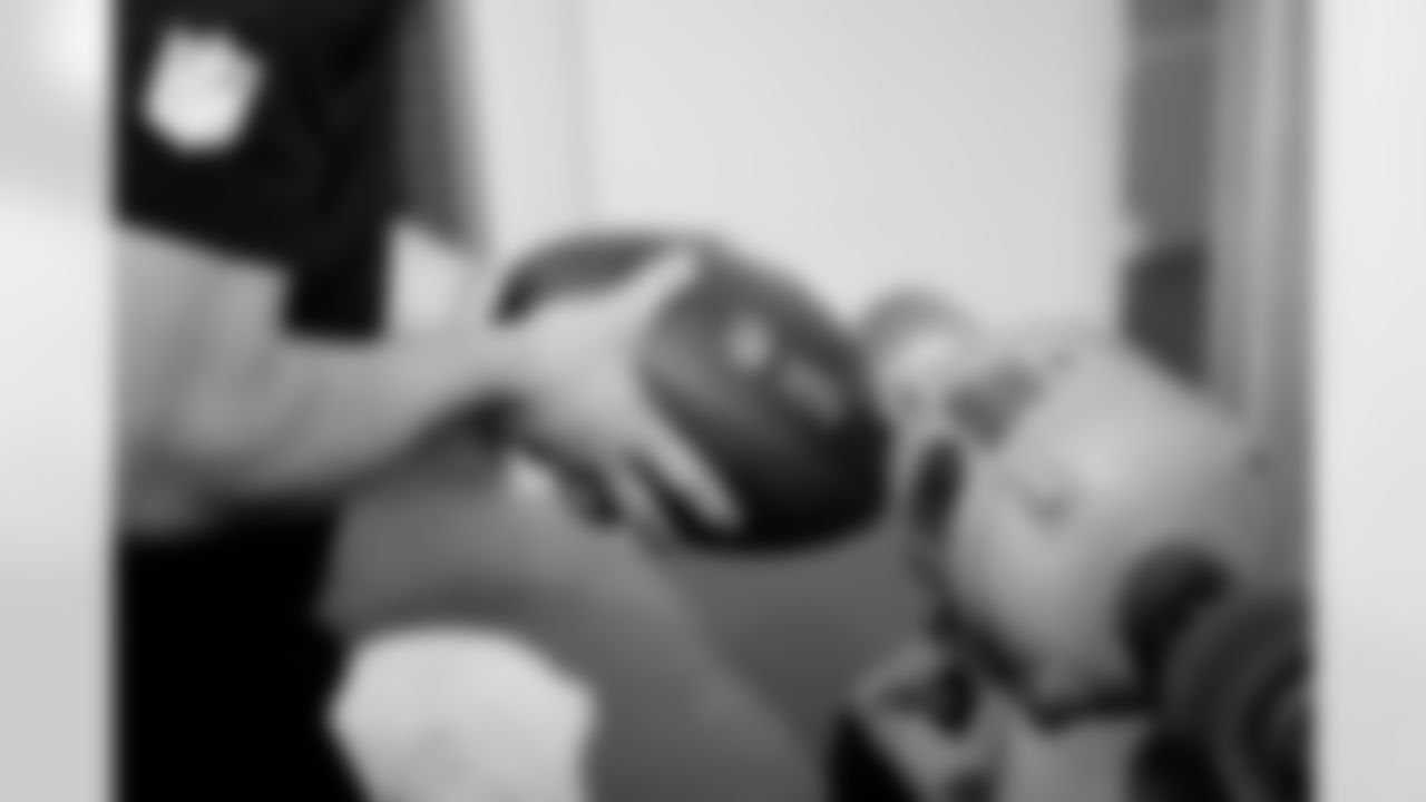 Jacksonville, Fla. — Jaguars football equipment staff prepare America 250 commemorative footballs at the Miller Electric Center on December 29, 2025.