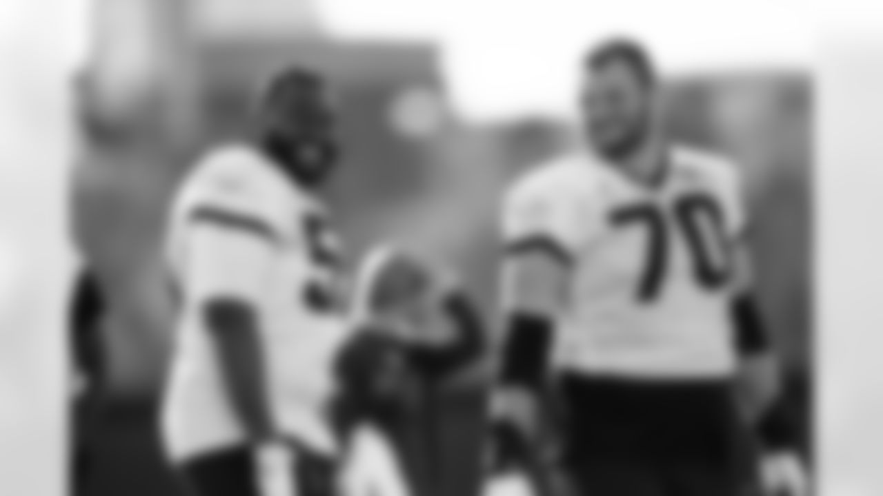 Jacksonville, Fla. — Jaguars offensive lineman Chuma Edoga (55) and offensive lineman Cole Van Lanen (70) during practice at the Miller Electric Center on December 25, 2025.