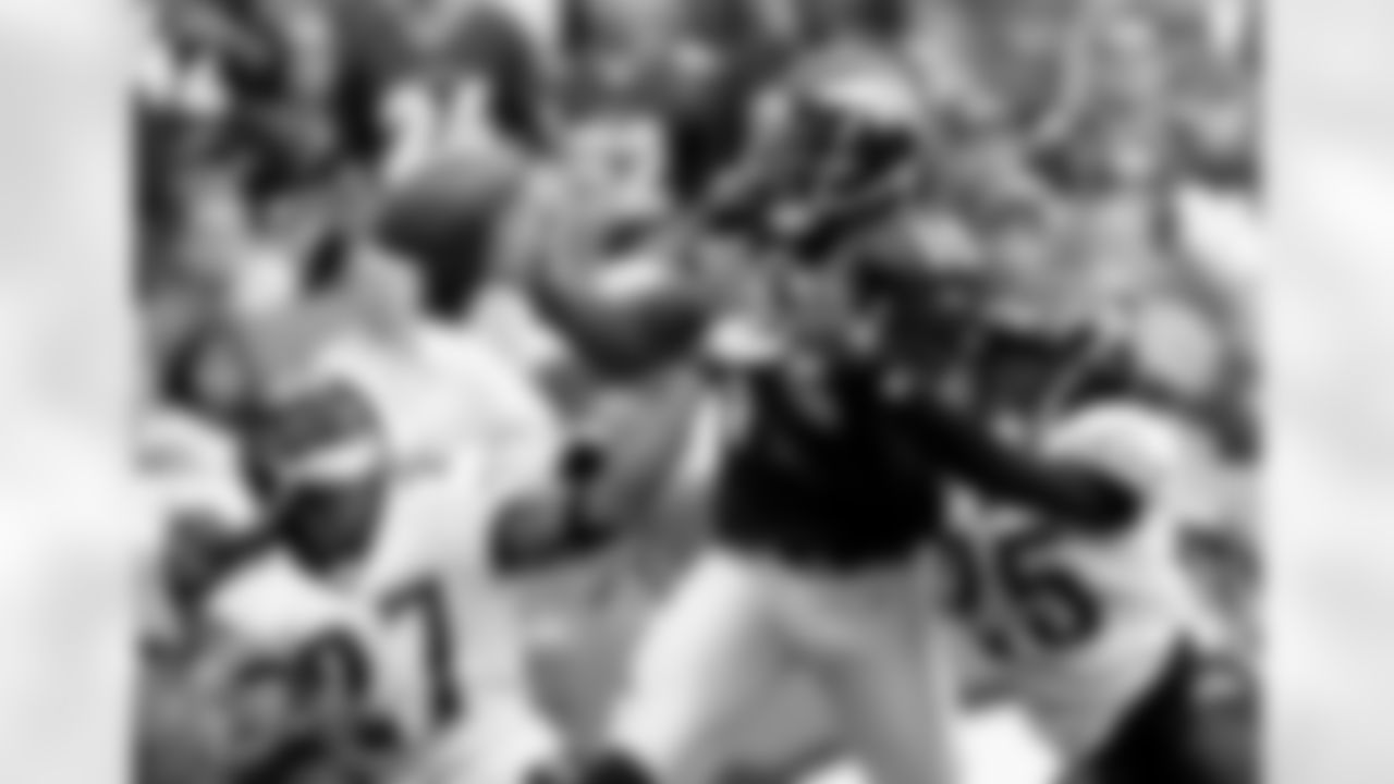 Denver Broncos wide receiver Brandon Marshall (15) bobbles a pass as Jacksonville Jaguars cornerback Rashean Mathis (27) and Reggie Nelson (25) defend during the third quarter of a football game in Denver, Sunday, Sept. 23, 2007. The Jaguars beat the Broncos, 23-14. (AP Photo/Jack Dempsey)