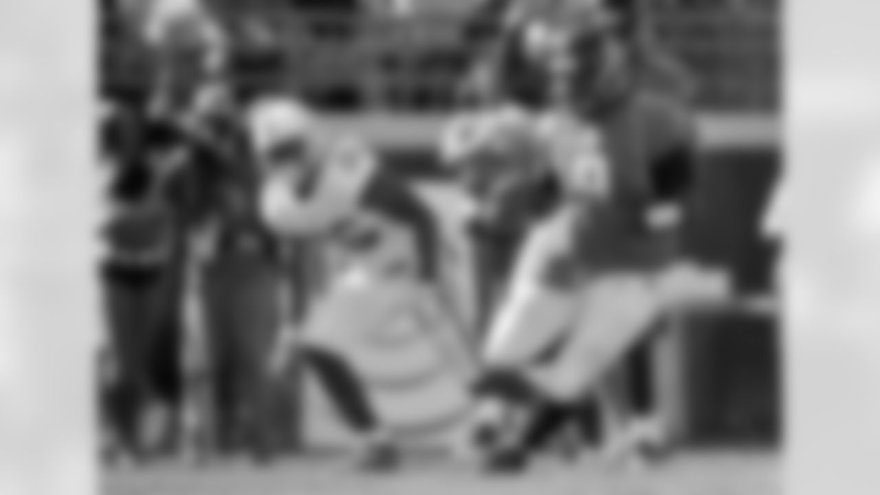 Jacksonville Jaguars quarterback David Garrard (9) runs past Indianapolis Colts cornerback Kelvin Hayden (26) on his way to the end zone to score a touchdown in the first quarter of a NFL football game Sunday, Oct. 3, 2010, in Jacksonville, Fla. (AP Photo/Stephen Morton)