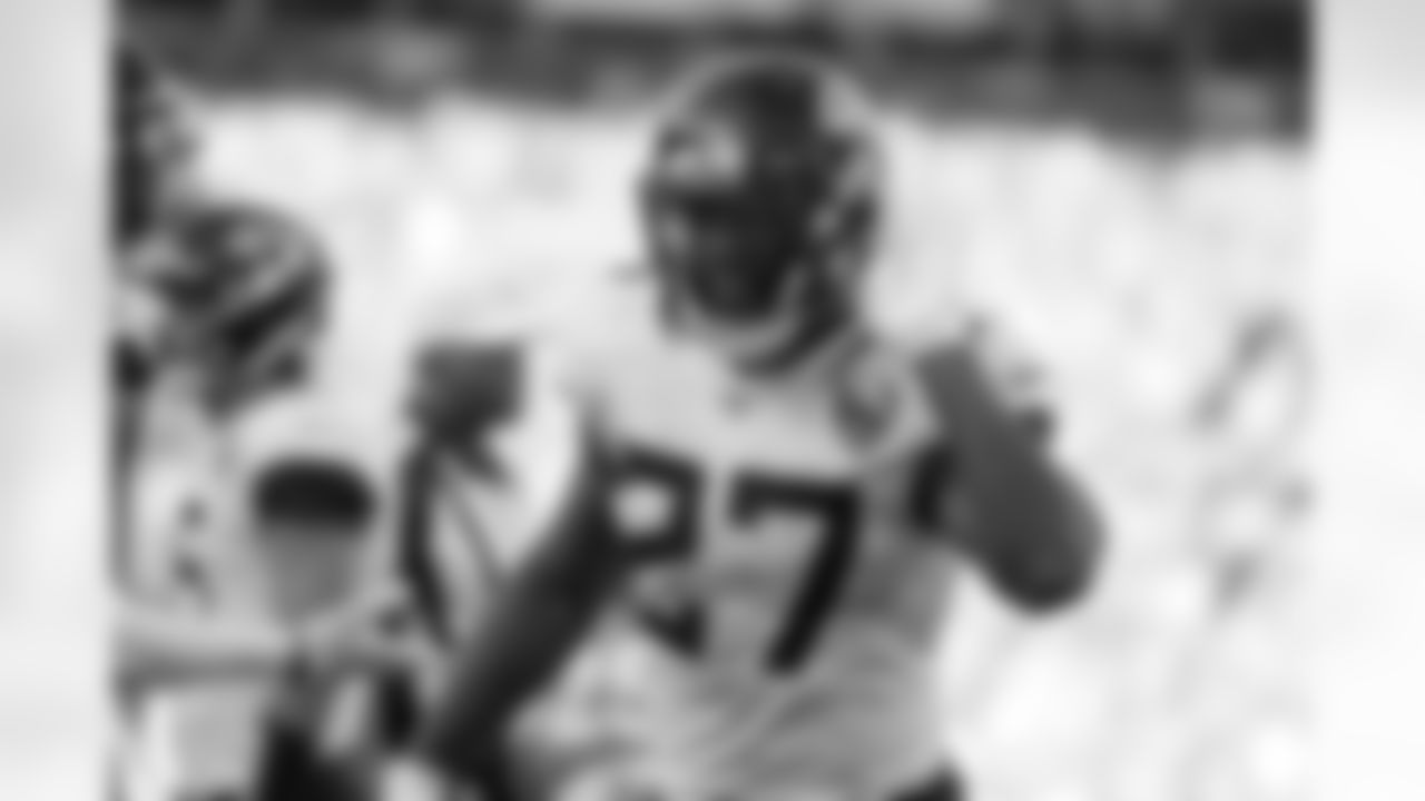 Jacksonville Jaguars running back Leonard Fournette reacts towards the crowd after a gain during the second half of an NFL football game against the Denver Broncos, Sunday, Sept. 29, 2019, in Denver. (AP Photo/Jack Dempsey)