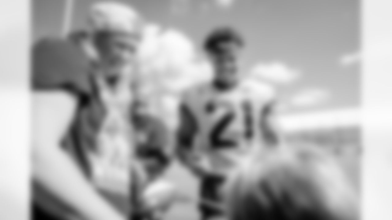 Jacksonville, Fla. — Jaguars cornerback Christian Braswell (21) signs autographs after training camp at the Miller Electric Center on July 25, 2025.