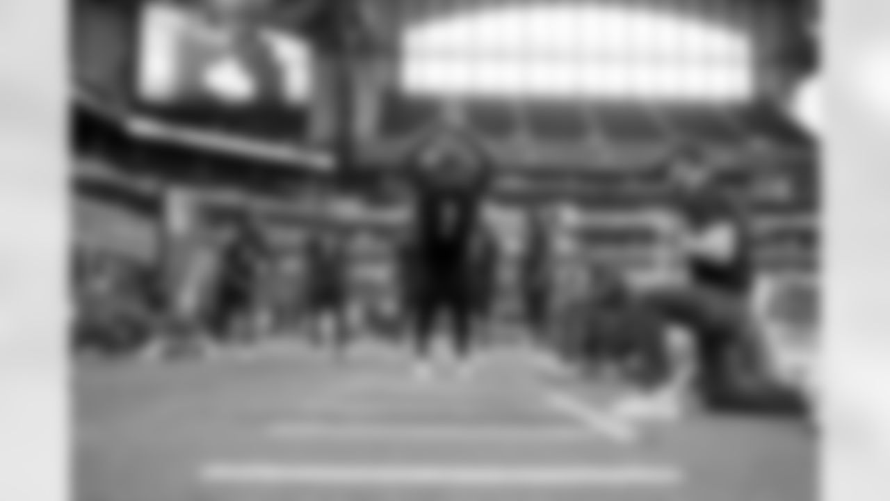 Connecticut defensive lineman Folorunso Fatukasi performs in the Broad Jump at the 2018 NFL Scouting Combine on Sunday, March 4, 2018, in Indianapolis. (AP Photo/Gregory Payan)
