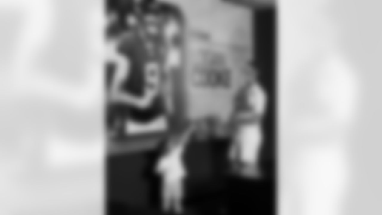 Jacksonville, Fla. — Jaguars punter Logan Cooke poses with his family after signing a contract extension at the Miller Electric Center on June 10, 2025.