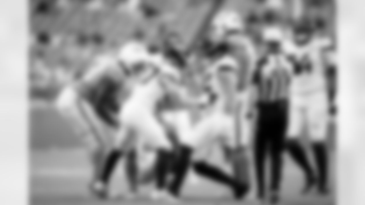 Jacksonville Jaguars vs Miami Dolphins
LB Dennis Gardeck (57) and DL Danny Striggow (92)