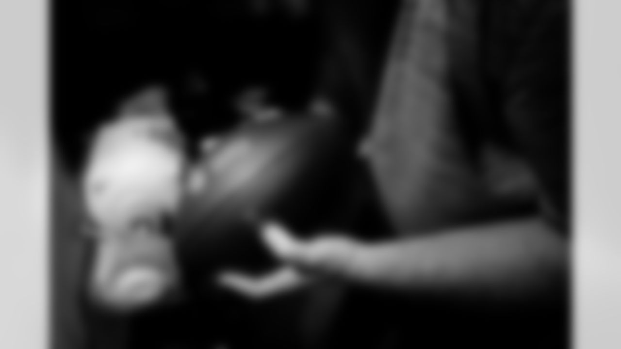 Jacksonville, Fla. — Jaguars football equipment staff prepare America 250 commemorative footballs at the Miller Electric Center on December 29, 2025.