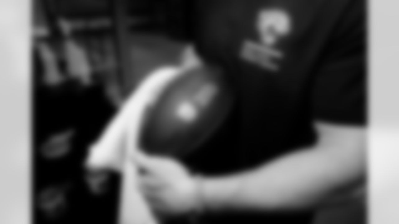 Jacksonville, Fla. — Jaguars football equipment staff prepare America 250 commemorative footballs at the Miller Electric Center on December 29, 2025.