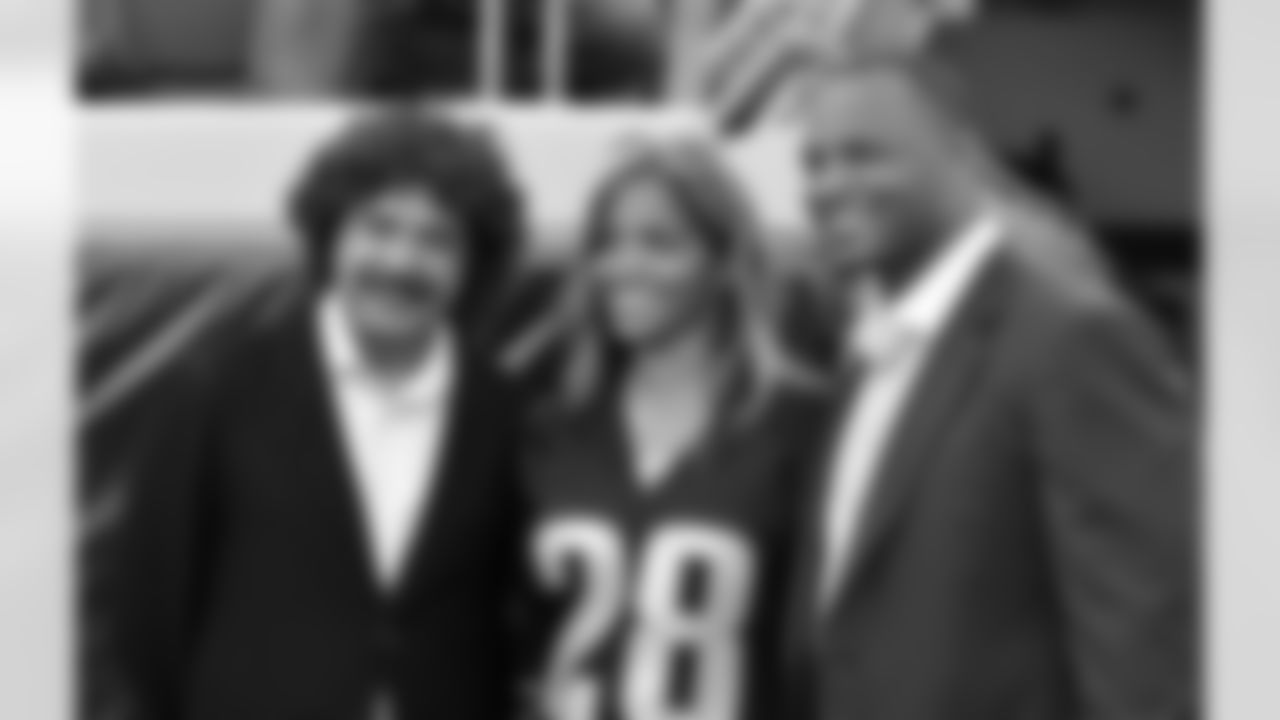 Jacksonville Jaguars team owner Shad Khan with Fred Taylor and his wife Andrea Sunday September 30, 2012 at EverBank Field Field in Jacksonville, Fl. (Rick Wilson/Jacksonville Jaguars)