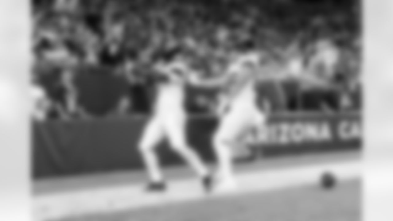 Jacksonville Jaguars vs Arizona Cardinals

RB Travis Etienne Jr. (1) and TE Johnny Mundt (86)