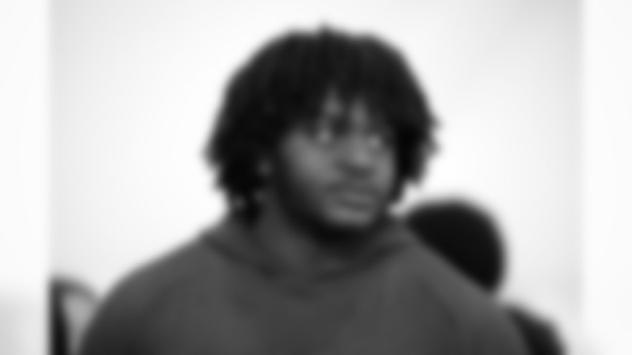 Missouri offensive lineman Armand Membou watches during the school's NFL football pro day, Friday, March 21, 2025, in Columbia, Mo. (AP Photo/Jeff Roberson)