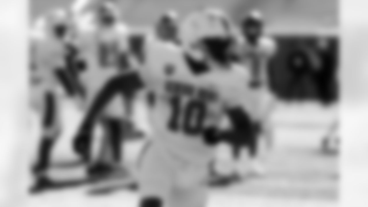 National Team running back Nick Singleton (10), of Penn State, runs through drills during practice for the Senior Bowl NCAA college football game Wednesday, Jan. 28, 2026, in Mobile, Ala. (AP Photo/Butch Dill)