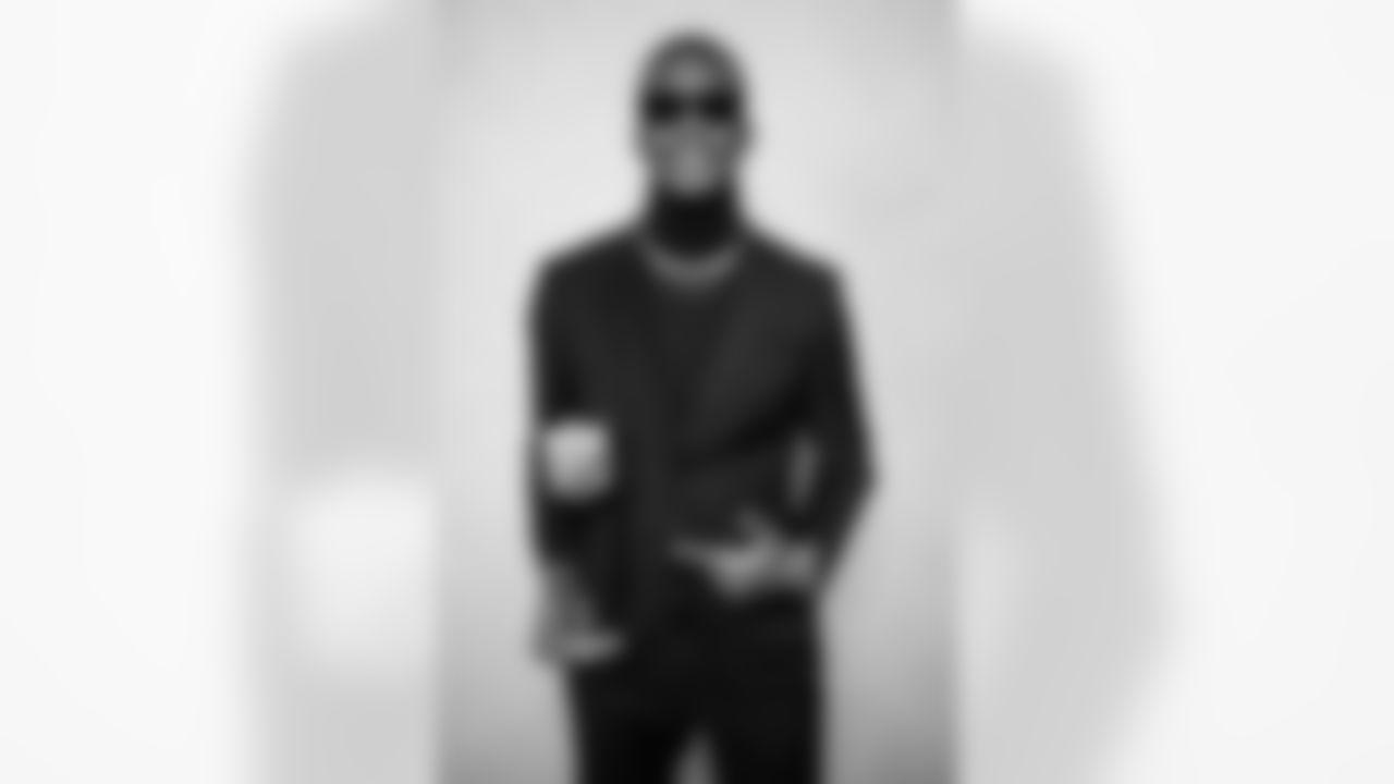 New York Jets wide receiver Garrett Wilson (17) poses for a portrait with the AP Offensive Rookie of the Year award during the NFL Honors awards show on Thursday, February 9, 2023 in Phoenix, Arizona. (Cooper Neill/NFL)
