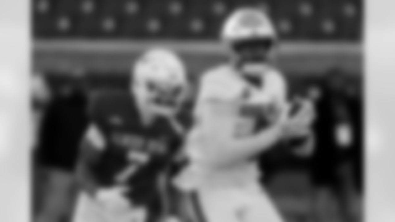 American Team wide receiver Malachi Fields (0), of Notre Dame catches a pass as American Team cornerback Malik Muhammad (7), of Texas, defends during practice for the Senior Bowl NCAA college football game, Wednesday, Jan. 28, 2026, in Mobile, Ala. (AP Photo/Butch Dill)