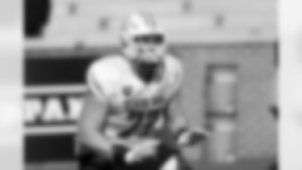 National Team offensive lineman Keylan Rutledge (77), of Georgia Tech, runs through drills during practice for the Senior Bowl NCAA college football game Tuesday, Jan. 27, 2026, in Mobile, Ala. (AP Photo/Butch Dill)