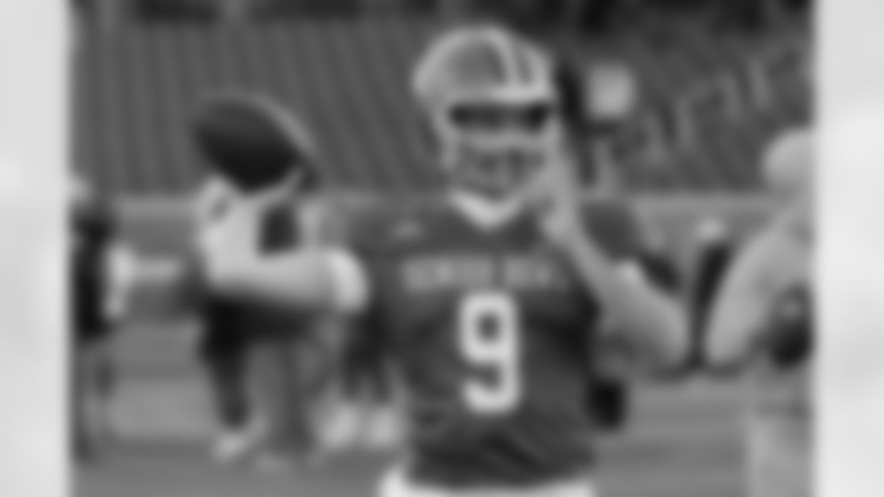 American Team quarterback Luke Altmyer (9), of Illinois, runs through drills during practice for the Senior Bowl NCAA college football game Tuesday, Jan. 27, 2026, in Mobile, Ala. (AP Photo/Butch Dill)