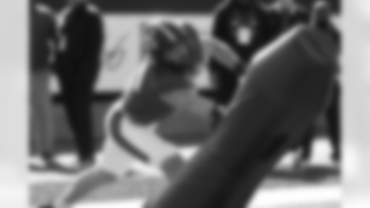 National Team defensive end Max Llewellyn (90), of Iowa, runs through drills during practice for the Senior Bowl NCAA college football game Wednesday, Jan. 28, 2026, in Mobile, Ala. (AP Photo/Butch Dill)