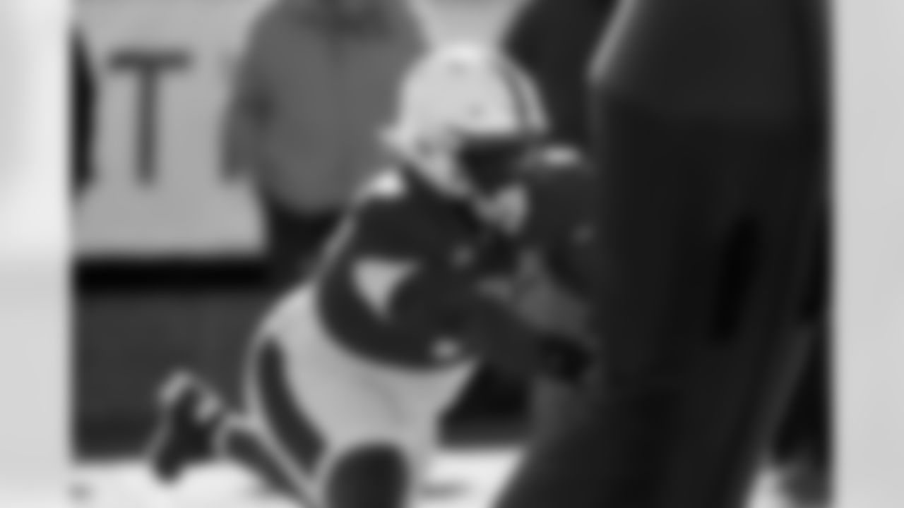 National Team defensive tackle Zane Durant (28), of Penn State, runs through drills during practice for the Senior Bowl NCAA college football game Wednesday, Jan. 28, 2026, in Mobile, Ala. (AP Photo/Butch Dill)