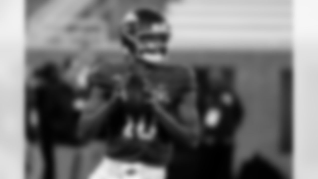 American Team quarterback Taylen Green (10), of Arkansas, looks to pass during practice for the Senior Bowl NCAA college football game, Wednesday, Jan. 28, 2026, in Mobile, Ala. (AP Photo/Butch Dill)