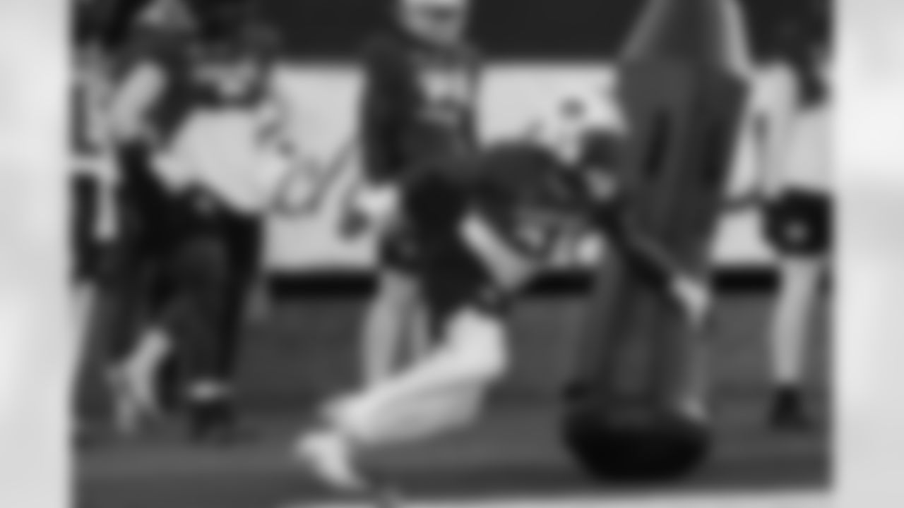 American Team outside linebacker Keyron Crawford (24), of Auburn, runs through drills during practice for the Senior Bowl NCAA college football game Tuesday, Jan. 27, 2026, in Mobile, Ala. (AP Photo/Butch Dill)