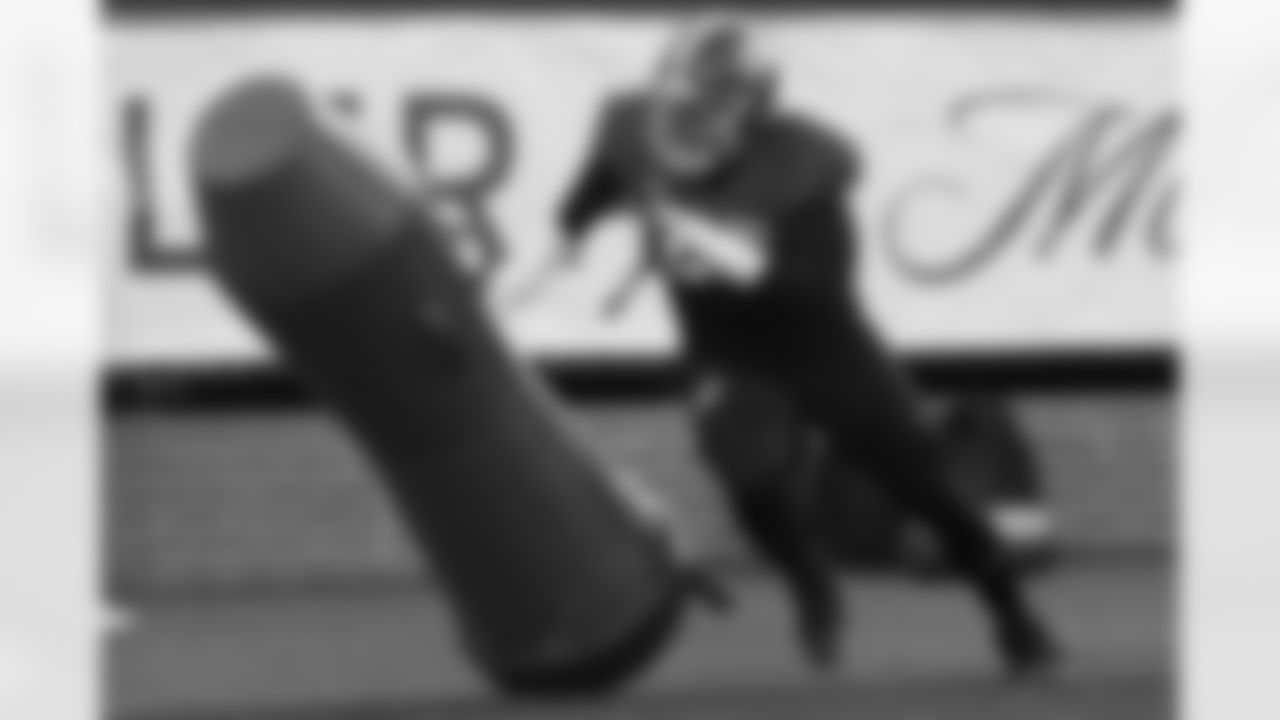 American Team defensive lineman Lt Overton (22), of Alabama, runs through drills during practice for the Senior Bowl NCAA college football game Tuesday, Jan. 27, 2026, in Mobile, Ala. (AP Photo/Butch Dill)